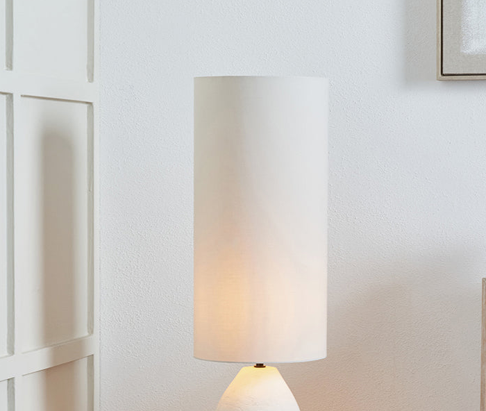 Modern White Ceramic Floor Lamp With An Off White Cotton Shade