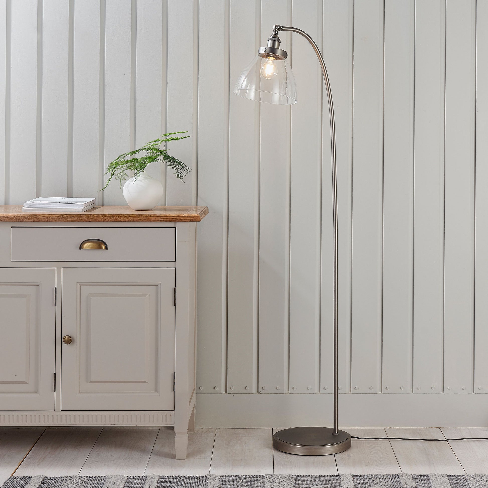 Elegant Clear Glass & Silver Floor Lamp – Curved Steel Design  