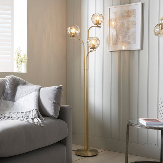 Elegant Brushed Brass Floor Lamp – Triple Globe Glass Shade Design  