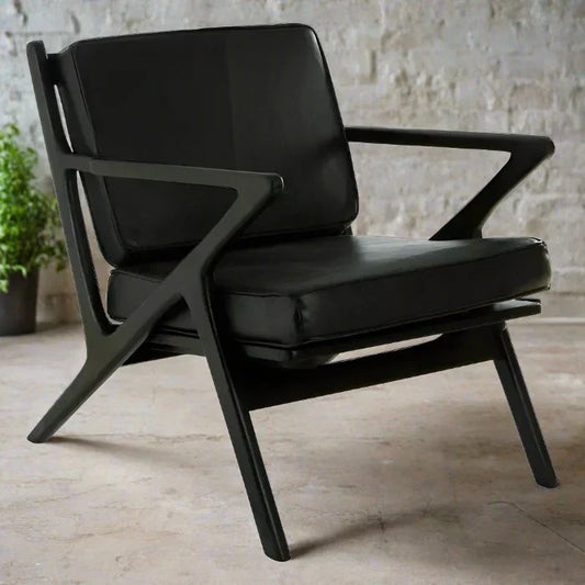 Modern Black Leather Armchair – Teak Frame & Sleek Design  