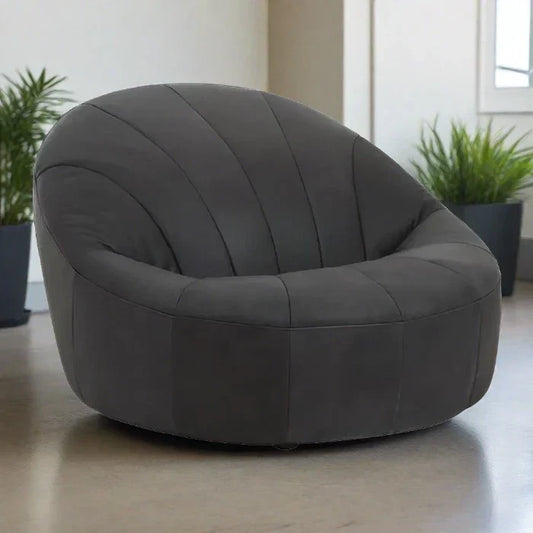 Modern Black Leather Swivel Chair – Curved Design & Foam Padding  